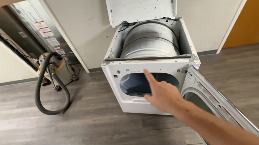 Dryer interior exposed with drum removed for inspection