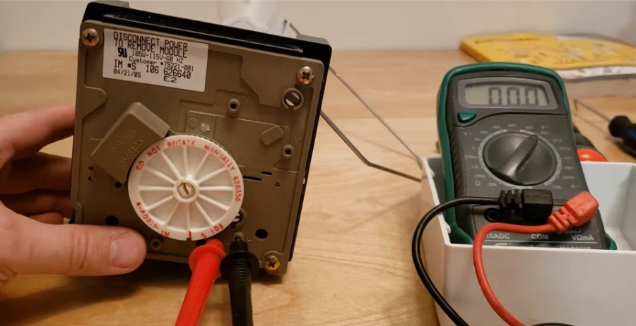 Testing ice maker module with multimeter for continuity