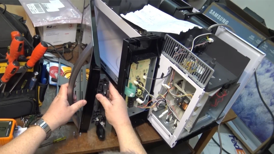 Microwave control panel removal during service