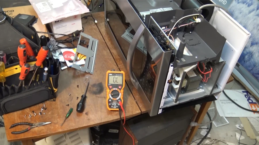 Technician performing microwave diagnostic testing